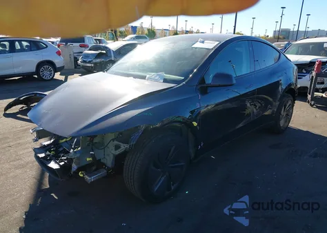 2026 Tesla Model Y Long Range Dual Motor All-Wheel Drive from USA, damaged, VIN 7SAYGDED5TF417138